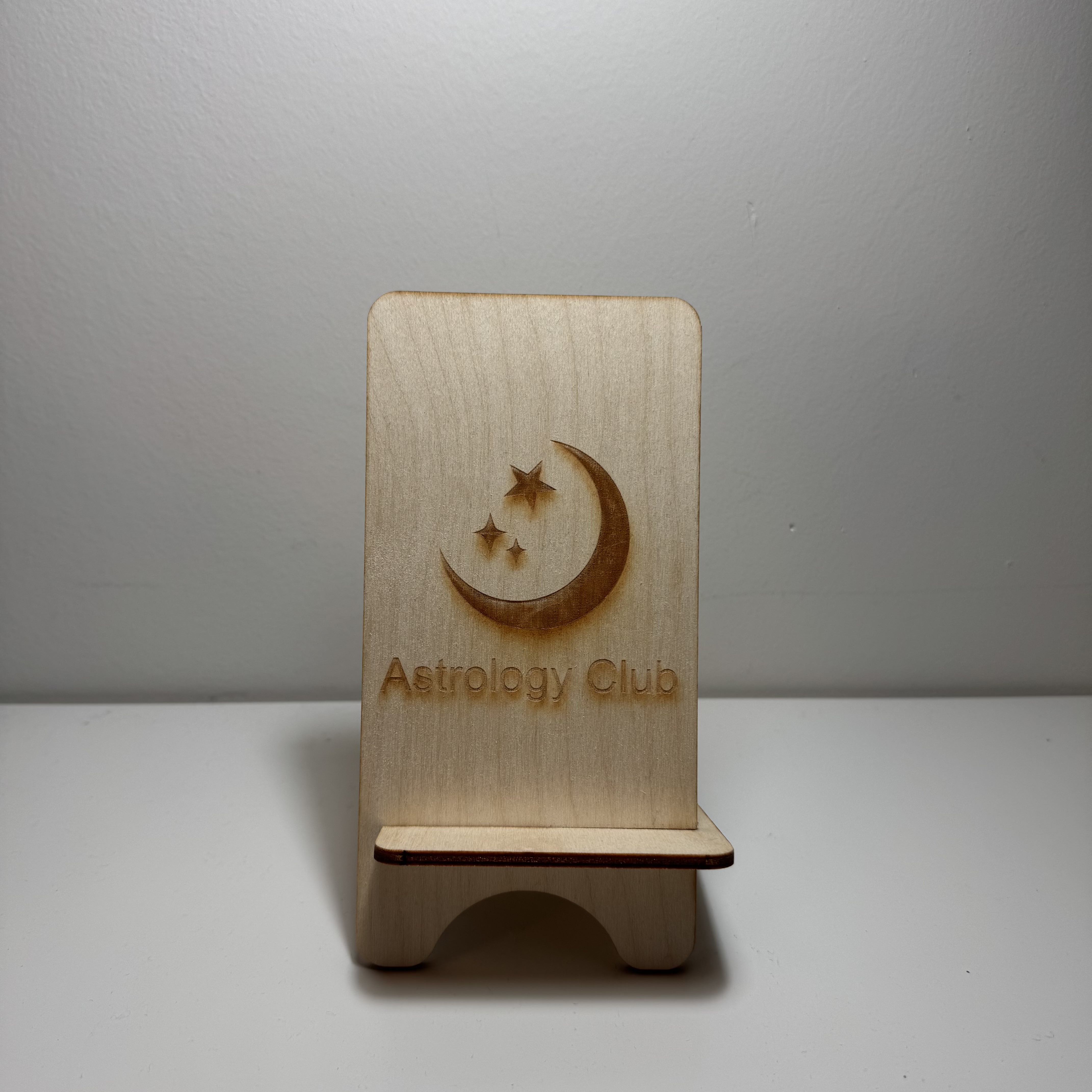 This is my phone stand. It allows user to put the phone on it to interact with it.