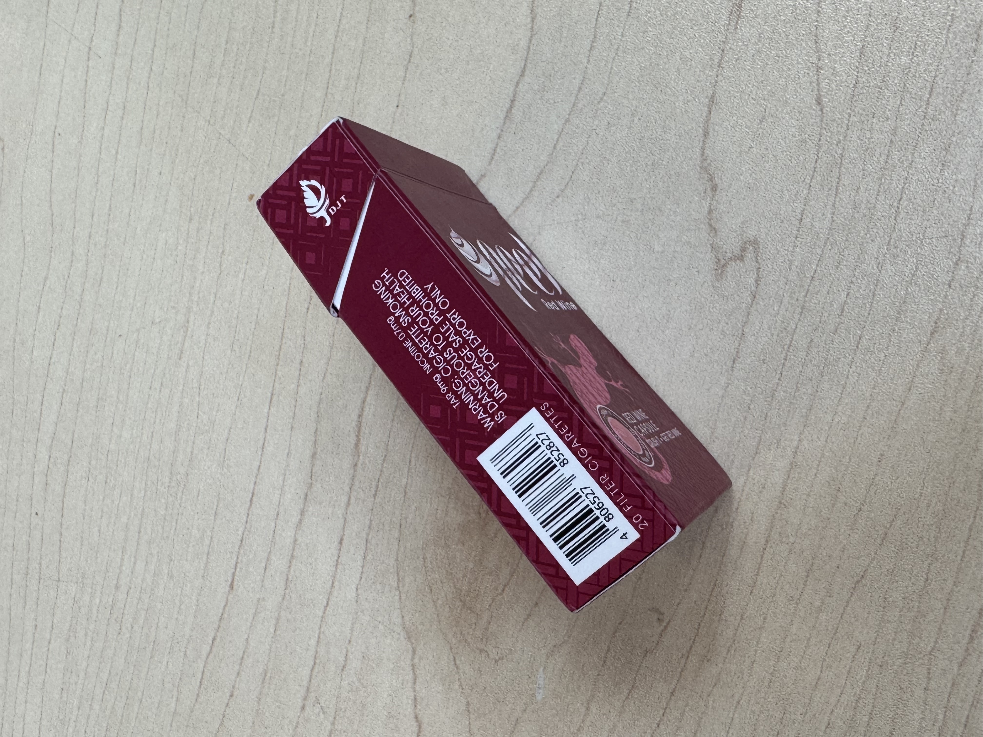 This is side shot image of a cigarettes box.