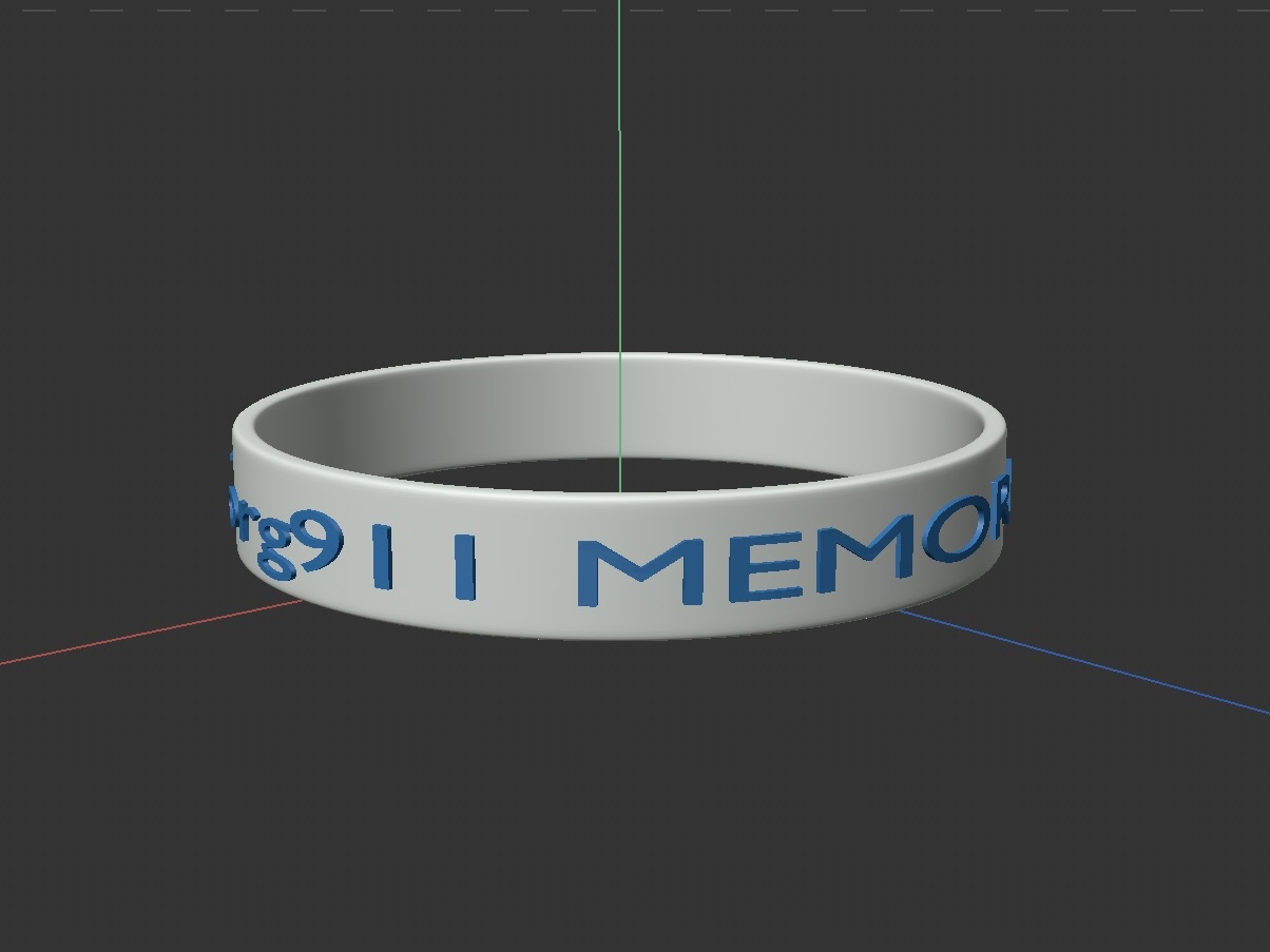 This is an image of the wristband model from another side. Each side has different word. They are: NEVERFORGET.org and 911 MEMORIAL. This is the souvenir I brought back from New York 911 Memorial Museum.