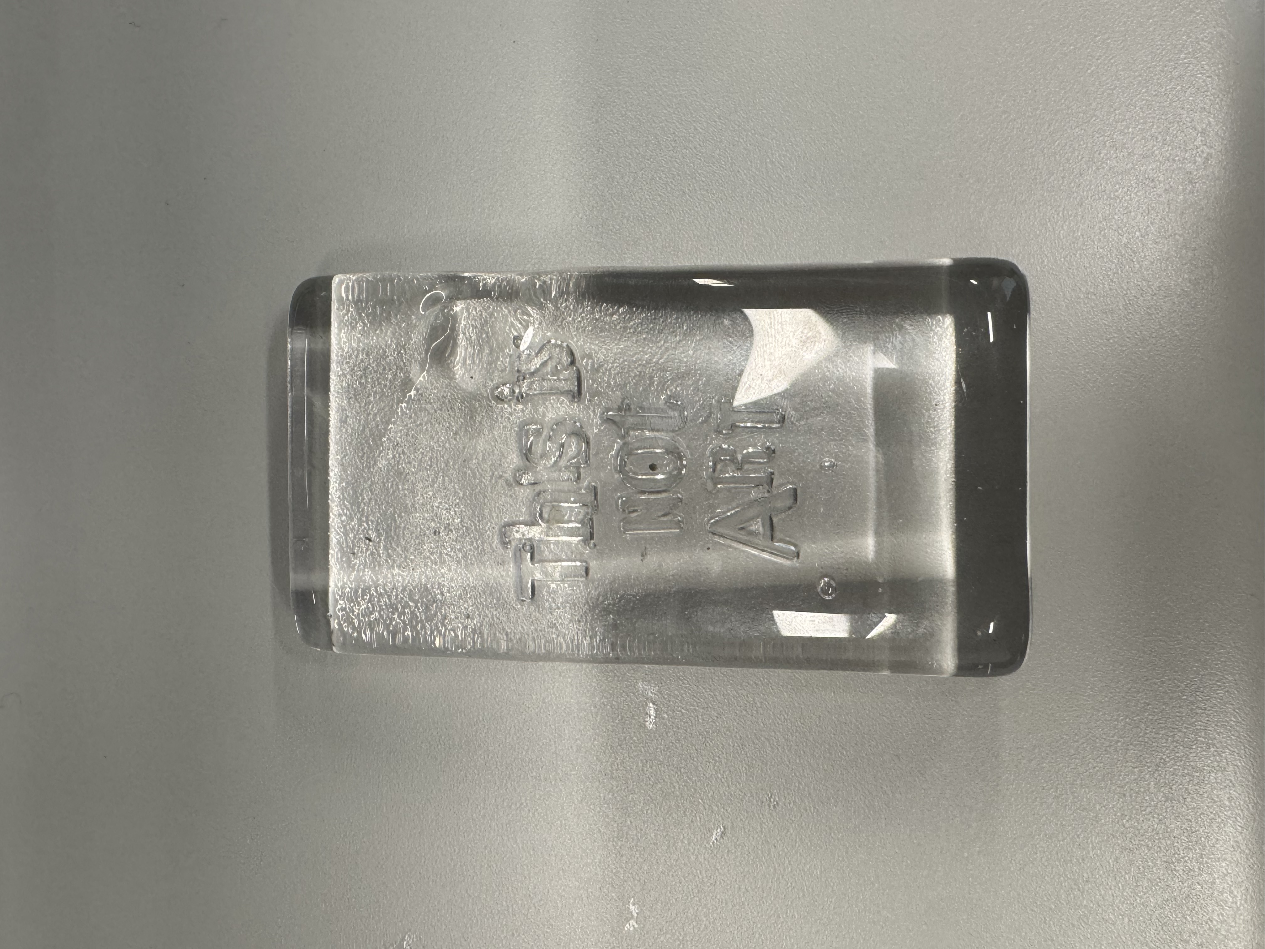 Glass Brick:
- Glass
- Material qualities: Transparent, rigid, fragile, glossy on the top and matte on the bottom
- Material State: Refined (processed from raw minerals into glass)
- Material Plasticity: Rigid
- Material Use: Containers, window, tools <a href='https://www.youtube.com/embed/tgbNymZ7vqY' target='_blank'><p>Project Video Link</p></a>