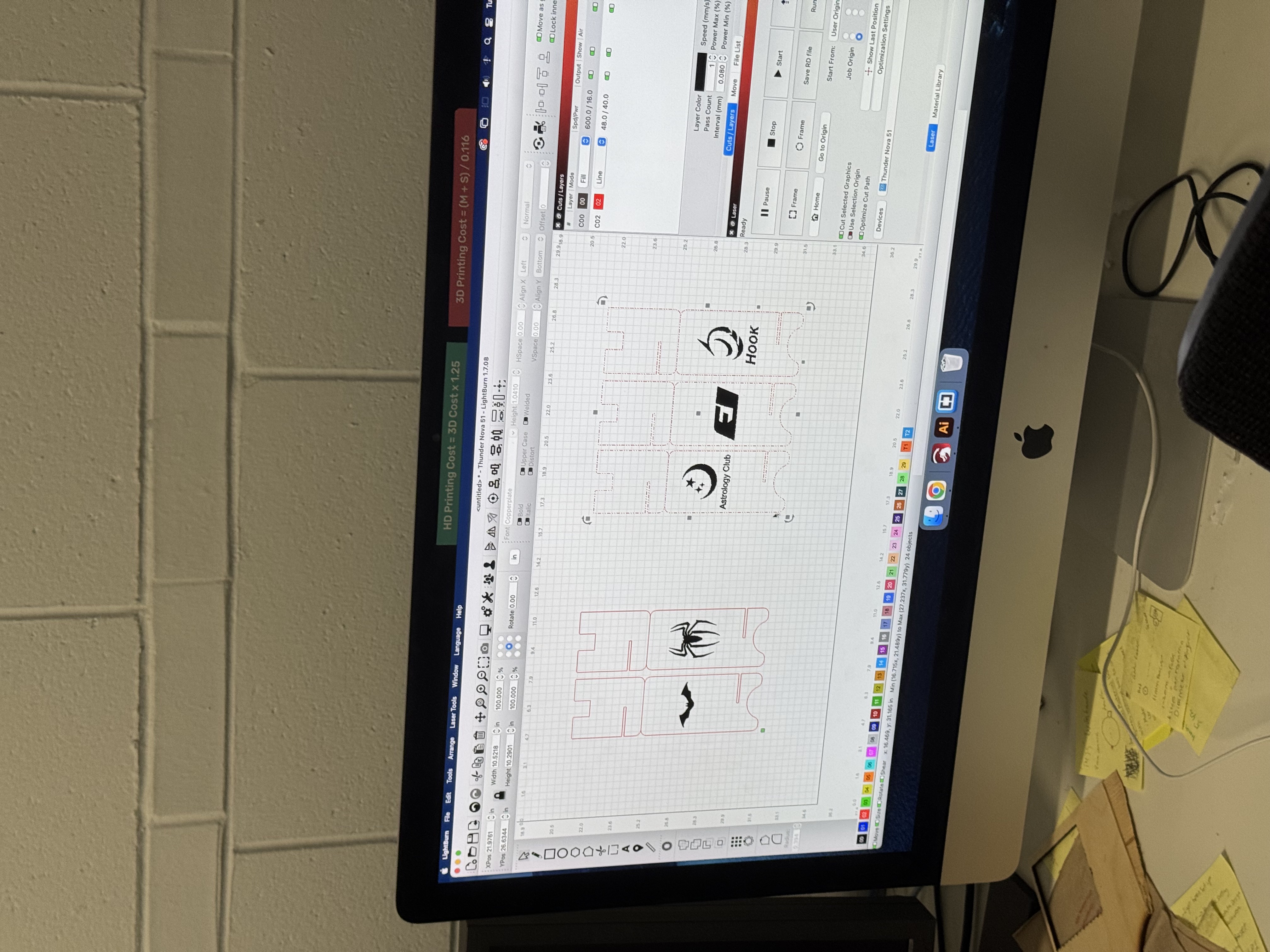 Inputing our design file into the computer in the lab
