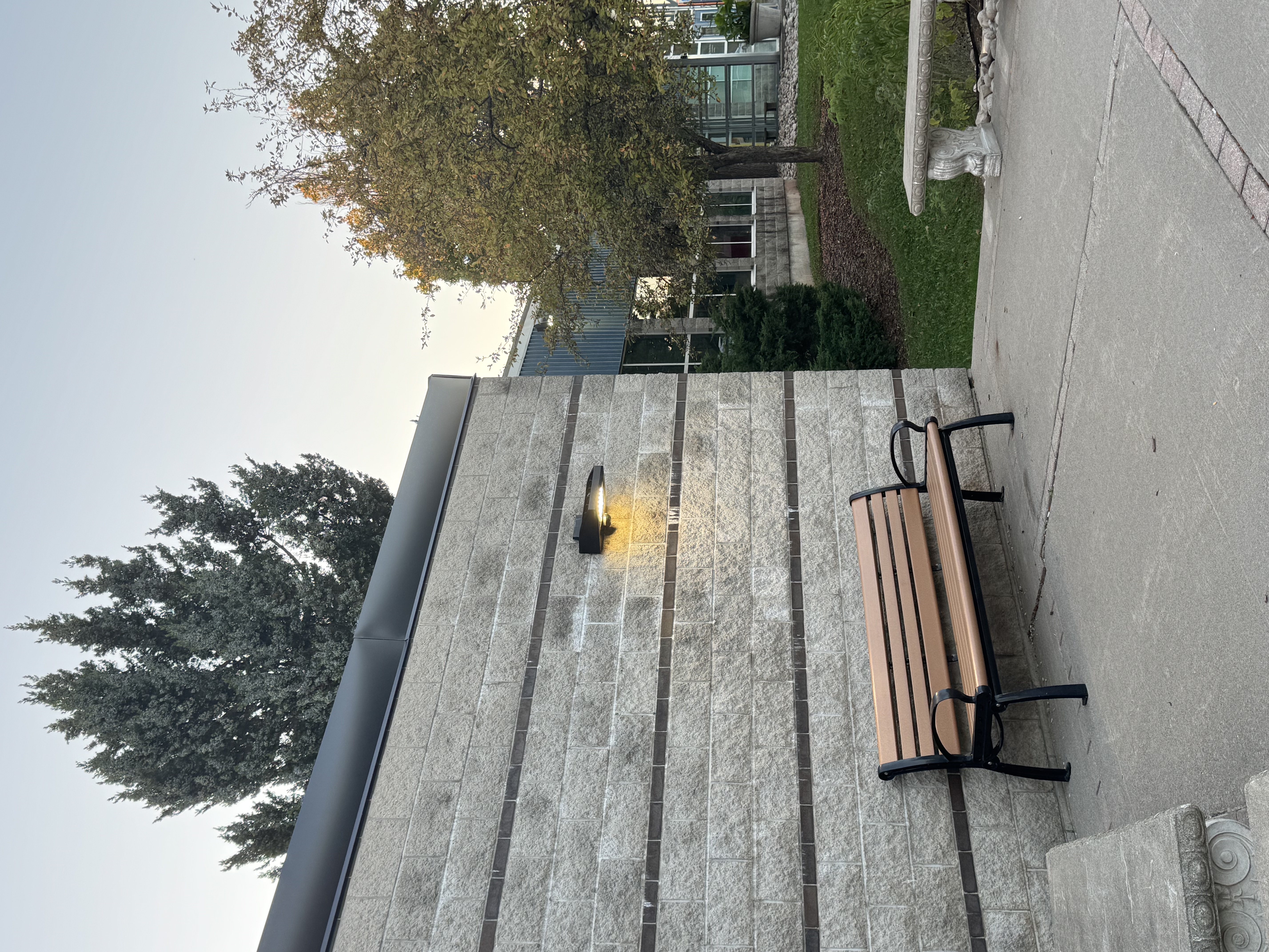 A corner of a bench between D wing and AA wing